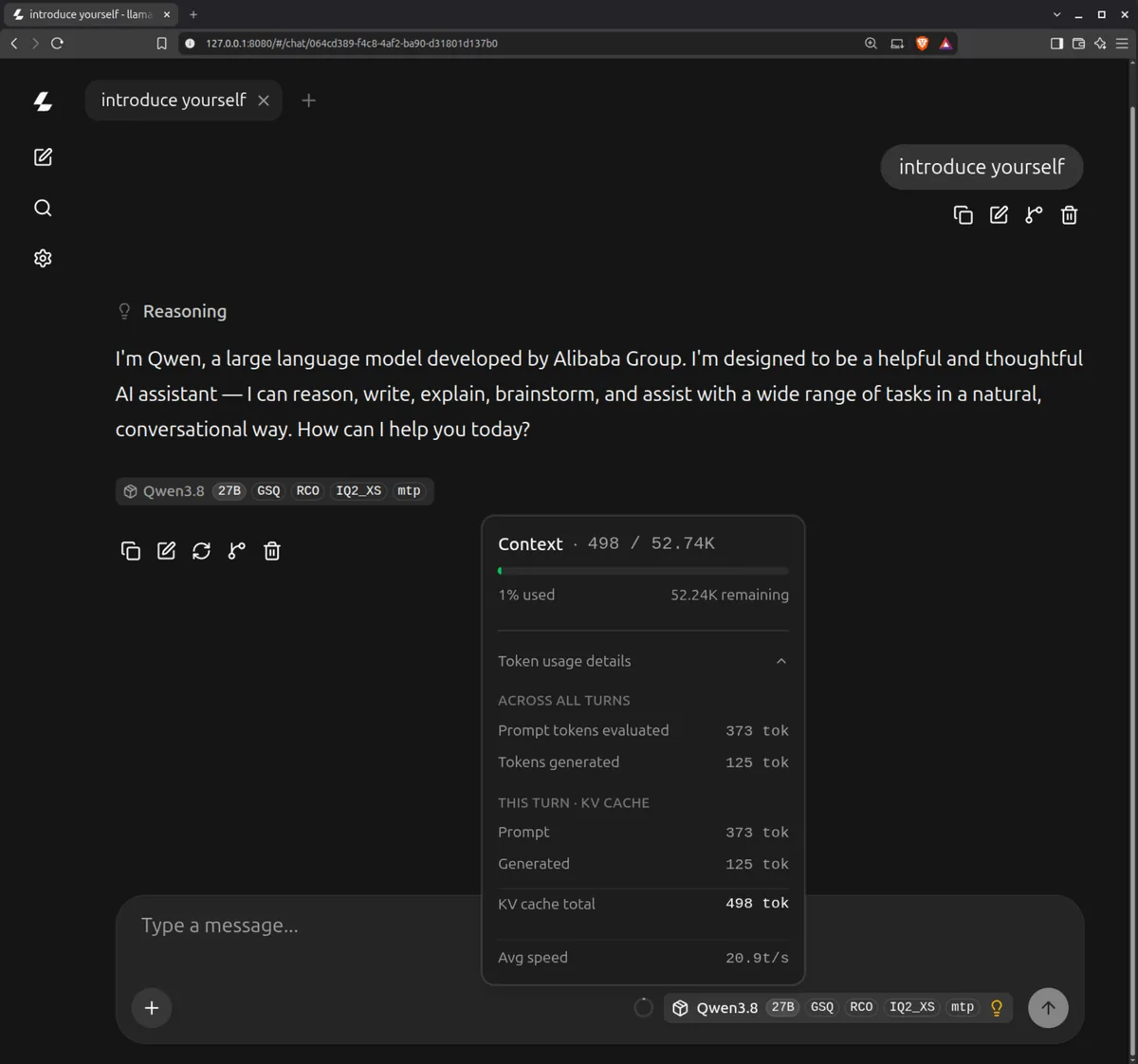 llama.cpp chat UI showing the IQ2_XS model introducing itself with 498 of 52.74K context used and average speed 20.9 tokens per second